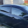 Set paravânturi auto Heko cu montajul în canal pentru CHEVROLET EPICA (2006) Sedan – 2 buc. față